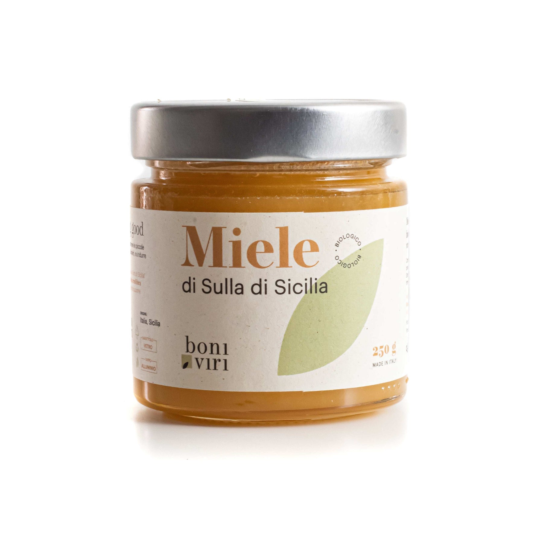 Miele biologico siciliano di ape sulla in barattolo